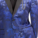 Blue paisley patterned suit jacket with a gold chain on a white background